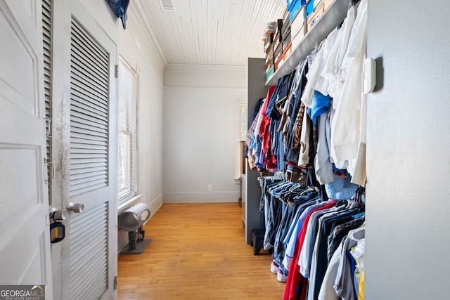 walk in closet featuring hardwood / wood-style floors