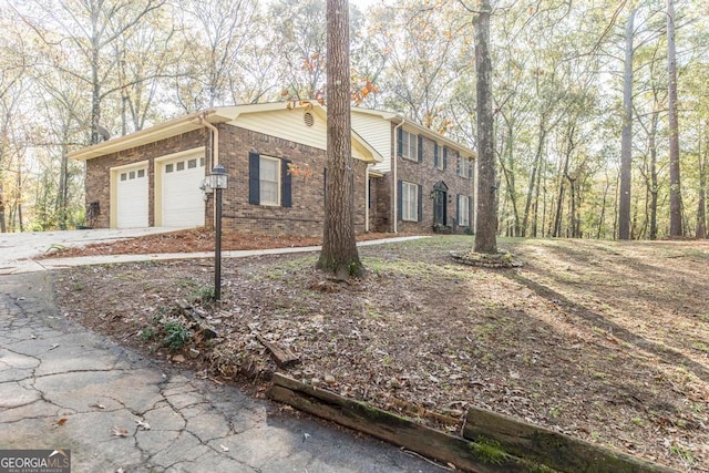 view of home's exterior with a garage