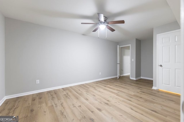 unfurnished bedroom featuring ceiling fan and light hardwood / wood-style flooring