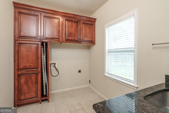 2505 Westchester Way, Conyers, GA 30013 - washroom featuring hookup for a washing machine, electric dryer hookup, healthy amount of natural light, and cabinet space
