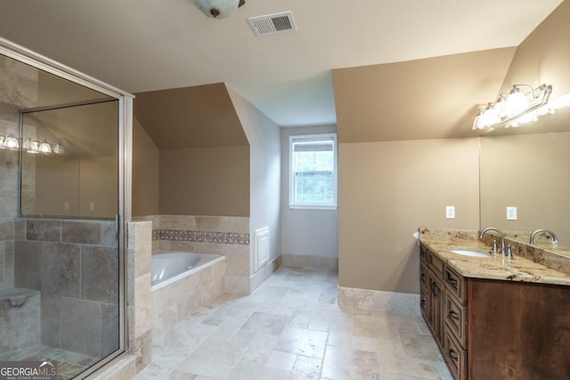 2505 Westchester Way, Conyers, GA 30013 - bathroom featuring double vanity, a garden tub, a shower stall, and baseboards