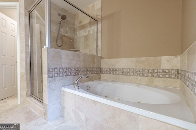 2505 Westchester Way, Conyers, GA 30013 - bathroom featuring a stall shower, a tub with jets, and tile patterned flooring