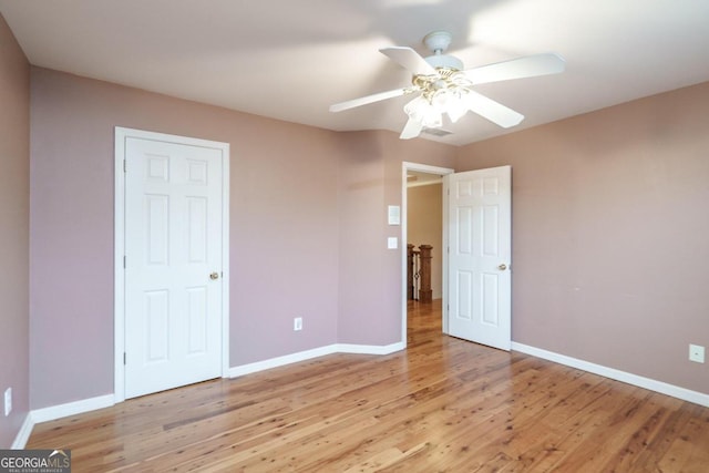 2505 Westchester Way, Conyers, GA 30013 - unfurnished bedroom with light wood-style floors and ceiling fan