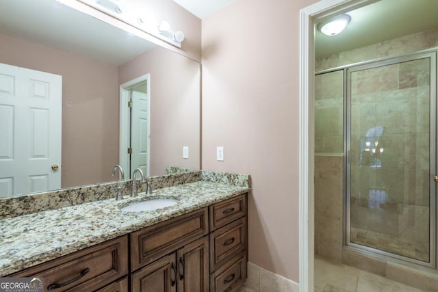 2505 Westchester Way, Conyers, GA 30013 - full bath with vanity, a stall shower, baseboards, and tile patterned floors