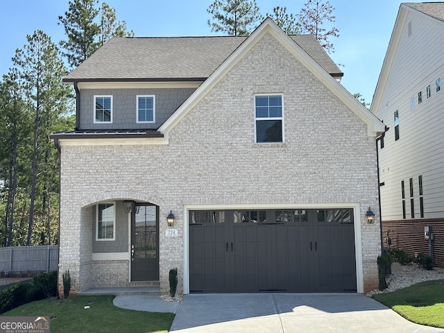 view of front of property with a garage