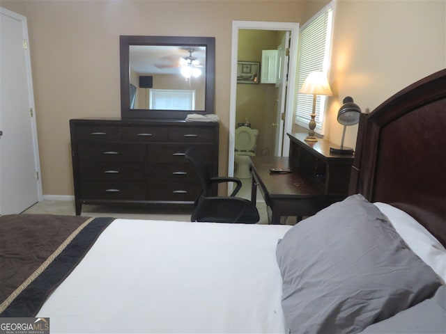 bedroom featuring light colored carpet