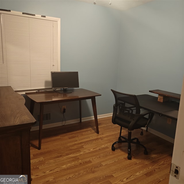 office space featuring light hardwood / wood-style floors