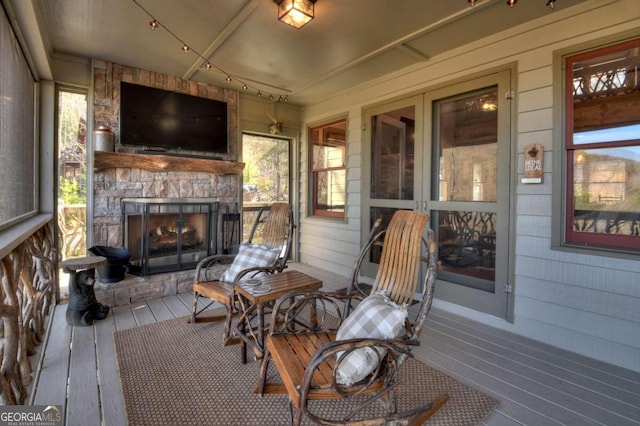 interior space featuring an outdoor stone fireplace