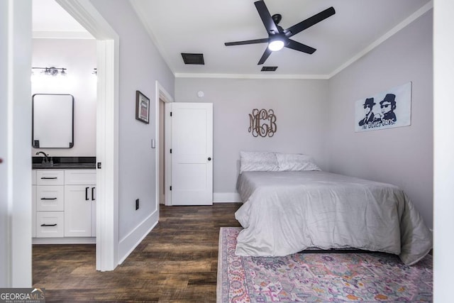 bedroom featuring ceiling fan, dark hardwood / wood-style flooring, ornamental molding, and ensuite bath