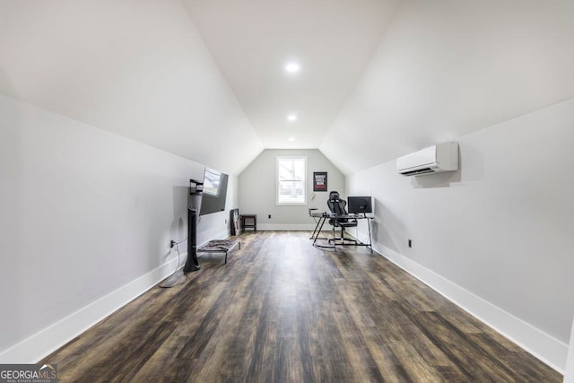 unfurnished office with lofted ceiling, dark hardwood / wood-style flooring, and a wall mounted air conditioner