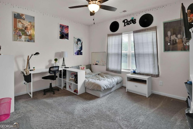 carpeted bedroom with ceiling fan