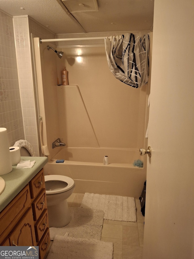full bath with vanity, tile patterned floors, bathtub / shower combination, and toilet