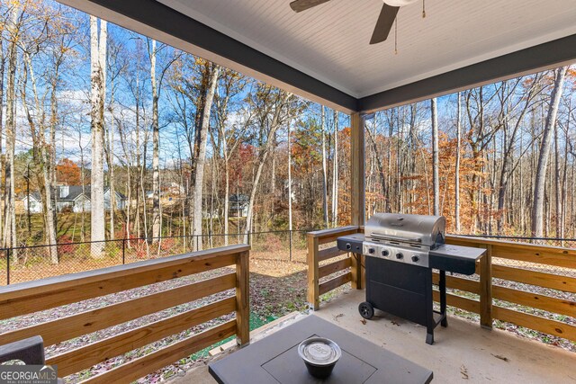 view of patio / terrace with ceiling fan and a grill