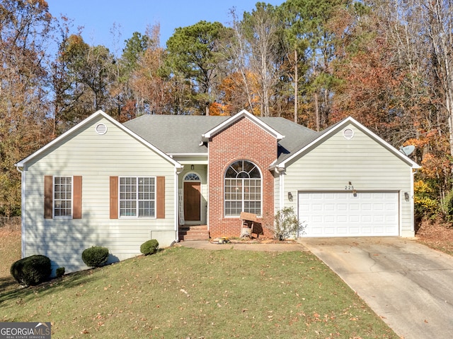 single story home with a garage and a front yard