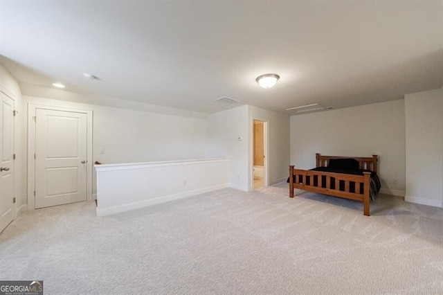 interior space featuring light colored carpet