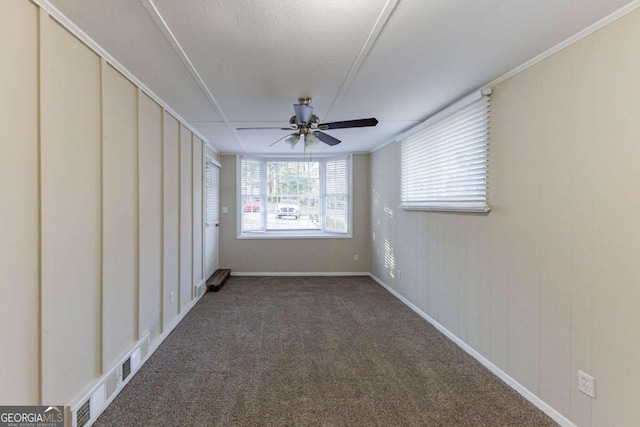 interior space with ceiling fan