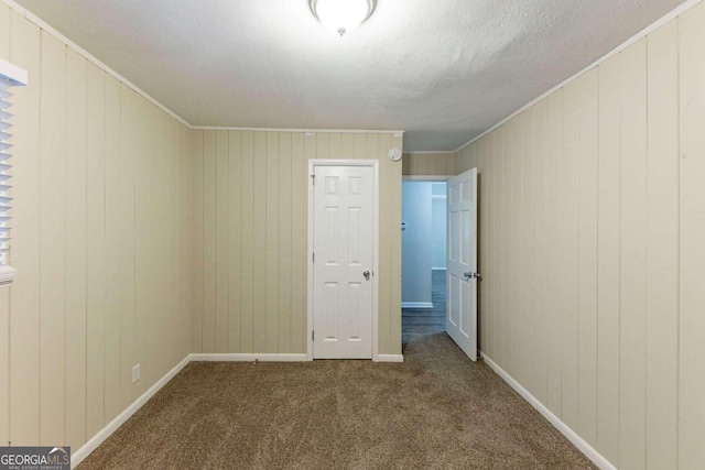 2363 Dabney Ter, Atlanta, GA 30344 - empty room with carpet, crown molding, and a textured ceiling
