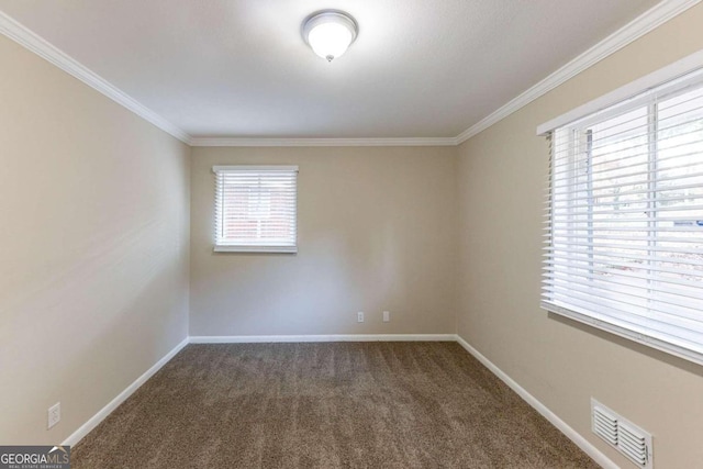 spare room with carpet and ornamental molding