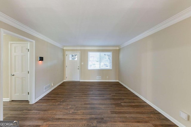 2363 Dabney Ter, Atlanta, GA 30344 - entryway with ornamental molding and dark wood-style floors
