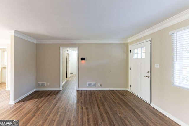 2363 Dabney Ter, Atlanta, GA 30344 - foyer entrance featuring wood finished floors and crown molding