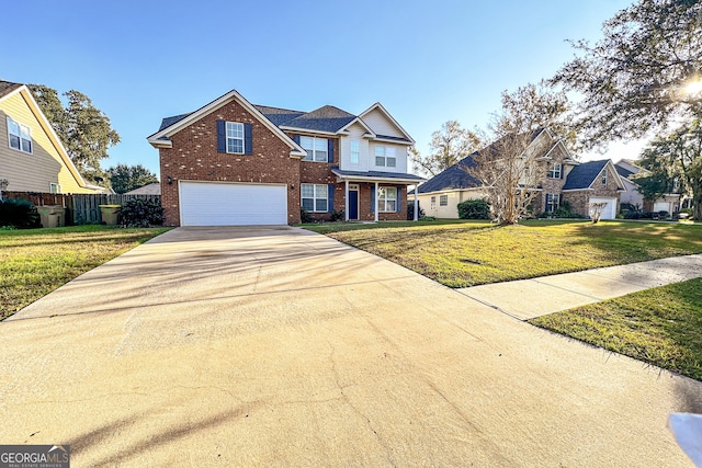 front of property featuring a front yard and a garage