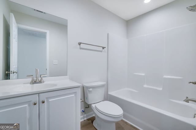 full bathroom featuring vanity, toilet, and shower / tub combination