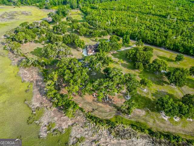 birds eye view of property featuring a rural view