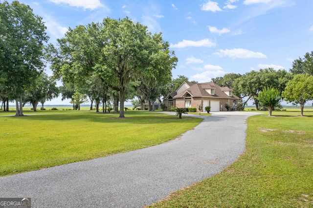 exterior space with a lawn