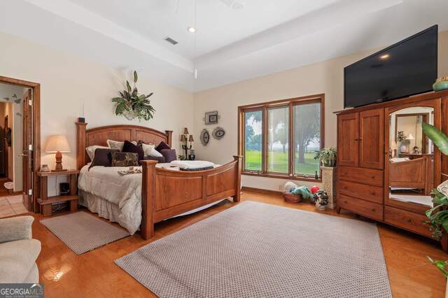 3917 Harris Neck Rd NE, Townsend, GA 31331 - bedroom with light wood-style floors