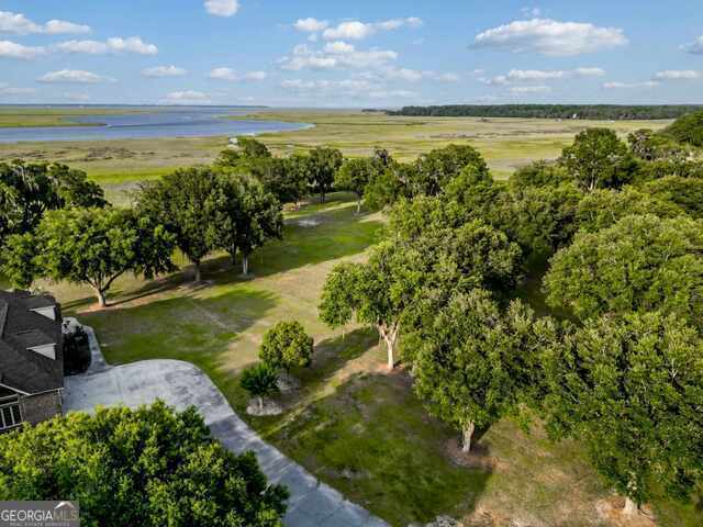 bird's eye view featuring a water view and a rural view