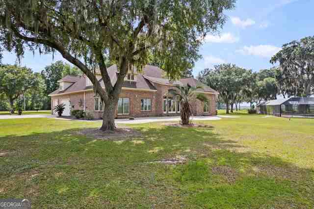 view of front of home with a front yard