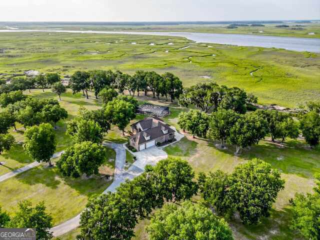 bird's eye view with a rural view and a water view