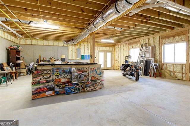 basement featuring electric panel