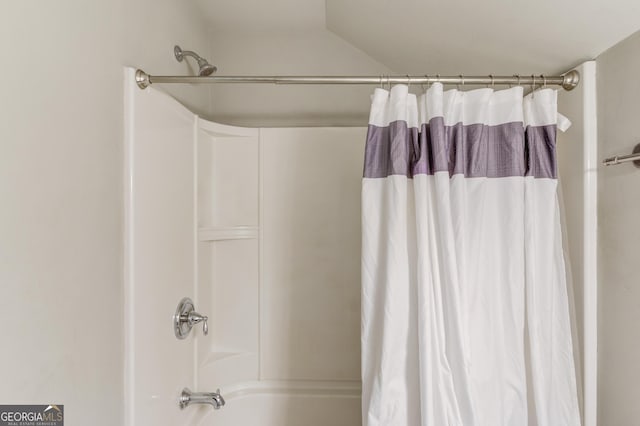 bathroom featuring shower / bath combination with curtain