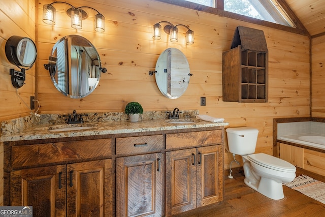 bathroom with a washtub, wood walls, wood-type flooring, lofted ceiling, and toilet