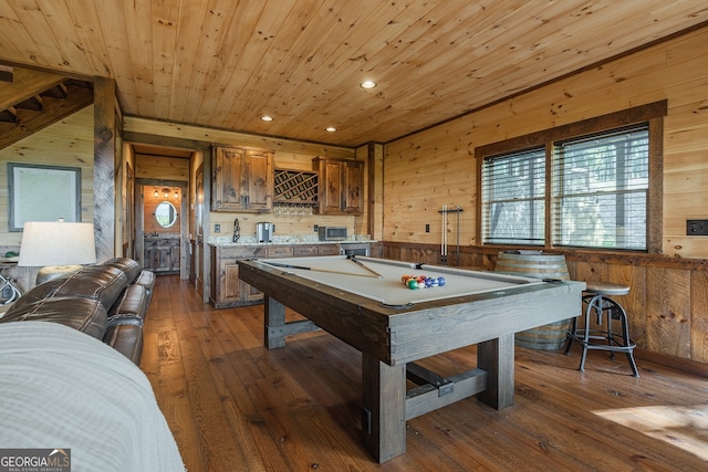 playroom with dark hardwood / wood-style flooring, wood ceiling, billiards, bar, and wood walls