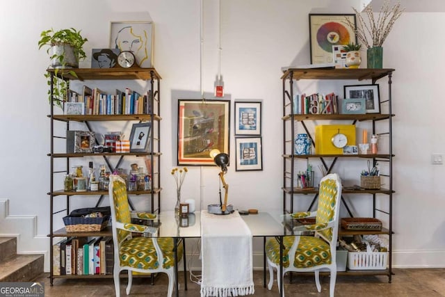 home office featuring concrete flooring