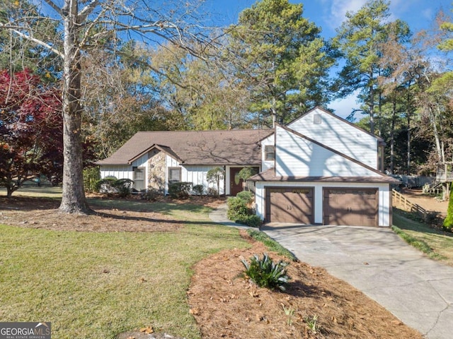 front facade with a front yard and a garage