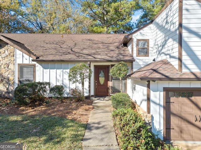 property entrance with a garage