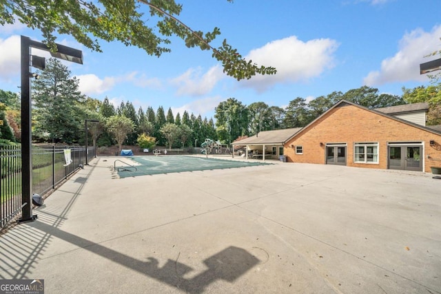 view of swimming pool featuring a patio