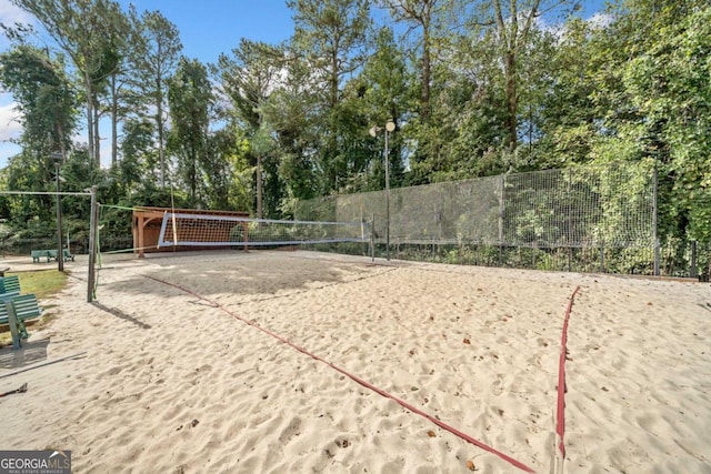 view of property's community featuring volleyball court