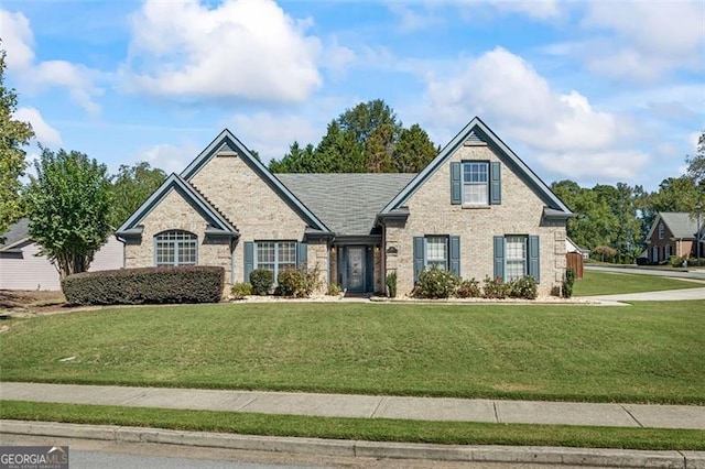 view of front facade with a front yard