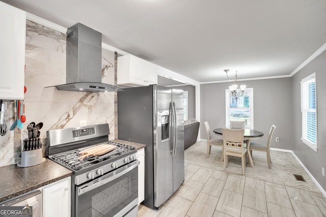 kitchen featuring white cabinets, a healthy amount of sunlight, wall chimney exhaust hood, and stainless steel appliances