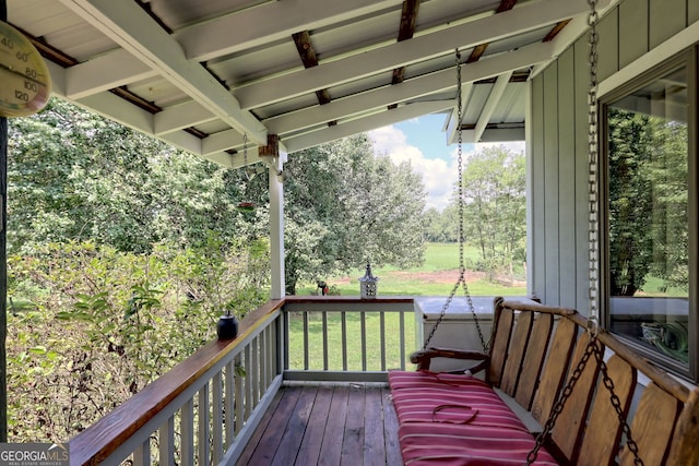 deck featuring a lawn