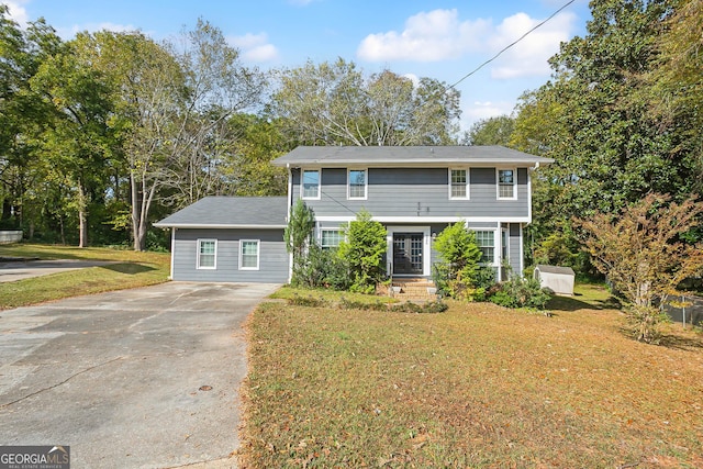 view of front facade with a front lawn