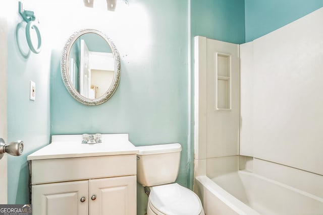 full bathroom featuring vanity, toilet, and bathing tub / shower combination