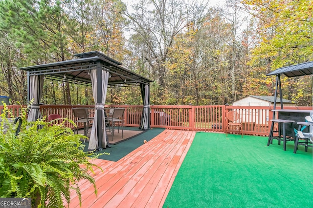 wooden deck with a gazebo