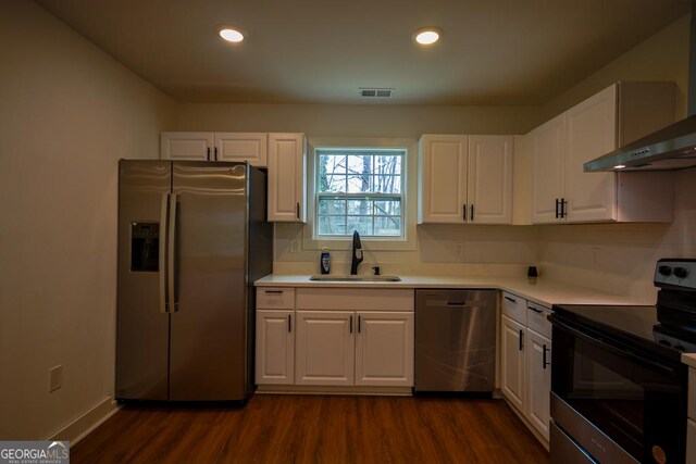 unfurnished room with ceiling fan and dark hardwood / wood-style flooring