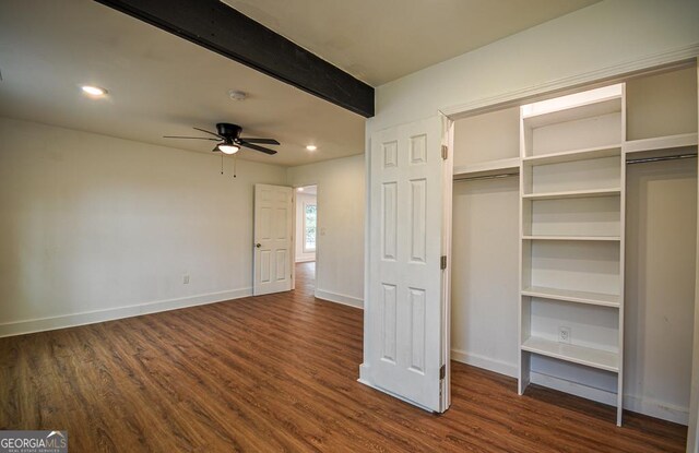 unfurnished room featuring hardwood / wood-style flooring and ceiling fan