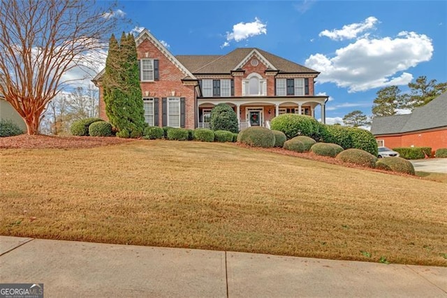 view of front of home with a front lawn